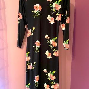 Ann Klein side tight dress. Mi length.